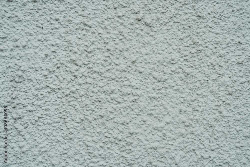 Light plastered wall with defects texture close up Light plastered wall with defects texture close up
