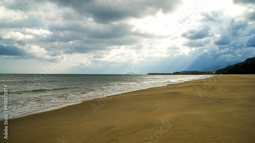 clouds over the sea on the wild beach  freedom travel concept  cloudy weather over the beach and sea on the island
