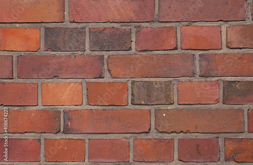 Old aged yellow orange red brick wall background texture