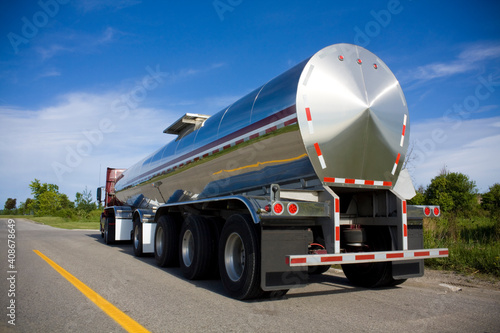 Tanker truck from behind on the road
