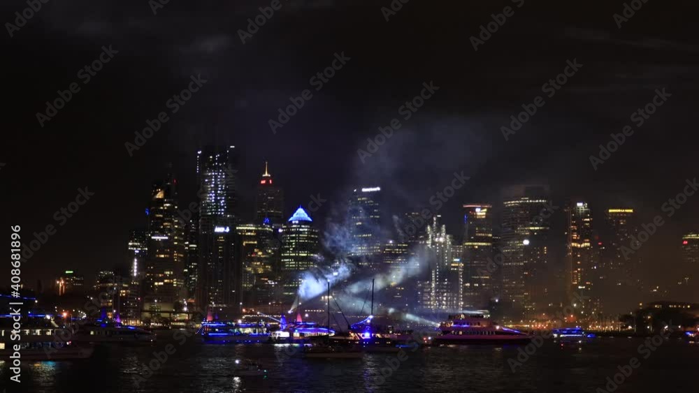 Bright light show of fireworks and laser beams in Sydney on Australia day 4k.
Bright light show of fireworks and laser beams in Sydney on Australia day 4k.