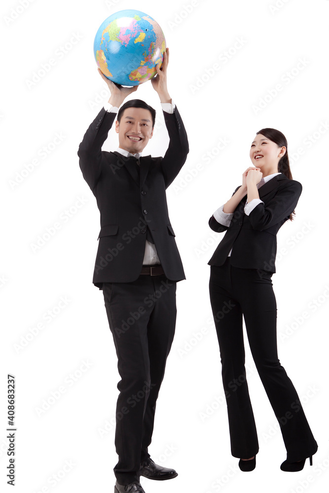 Business people holding a globe