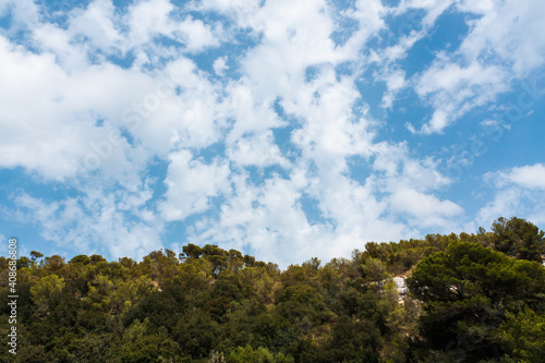 Clouds in the blue sky at Cala Macarelleta  Menorca  Balearic Islands  Spain