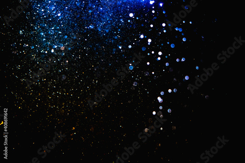 Glittering stars of blur blue bokeh