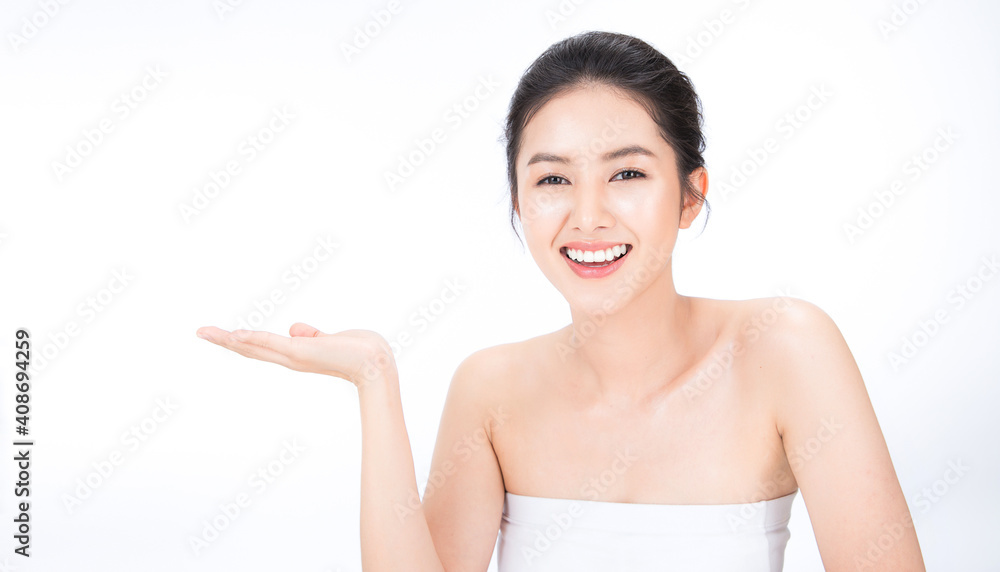 © paulaphoto - Beauty asian woman fair perfect healthy glow skin.Girl show empty copy space on open hand palm for text. Proposing a product. Gestures for advertisement. Asia girl pretty smile on face. © paulaphoto - Beauty asian woman fair perfect healthy glow skin.Girl show empty copy space on open hand palm for text. Proposing a product. Gestures for advertisement. Asia girl pretty smile on face.