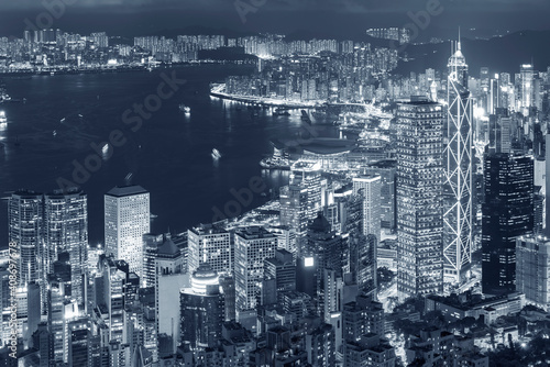 Victoria Harbor of Hong Kong city at night © leeyiutung