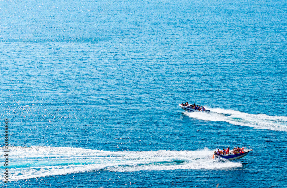 Fototapeta premium amazing view to two yachts or boats and clear dark blue water summer paradise. Copy space