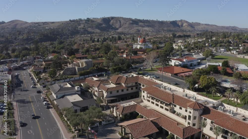 Daytime aerial view of the Spanish Colonial era mission and surrounding city of downtown San Juan Capistrano, California, USA. Daytime aerial view of the Spanish Colonial era mission and surrounding city of downtown San Juan Capistrano, California, USA.