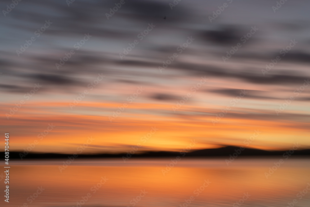 Golden hour morning light over Waimapu Estuary bay motion blur abstract. Golden hour morning light over Waimapu Estuary bay motion blur abstract.