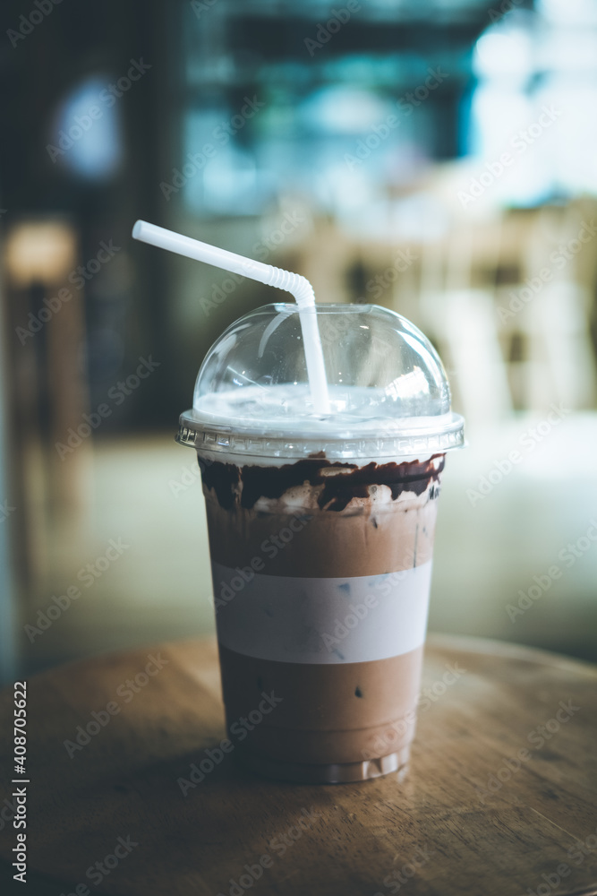 Ice cold coffee mocha in plastic glass. Ice cold coffee mocha in plastic glass.