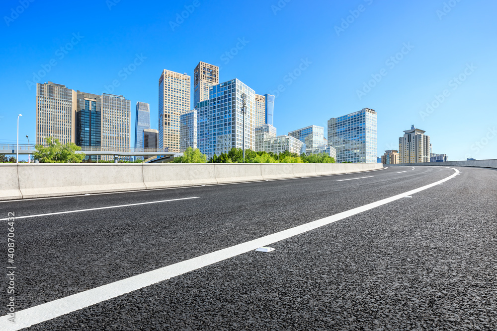 Asphalt road and modern city commercial buildings in Beijing,China. Asphalt road and modern city commercial buildings in Beijing,China.