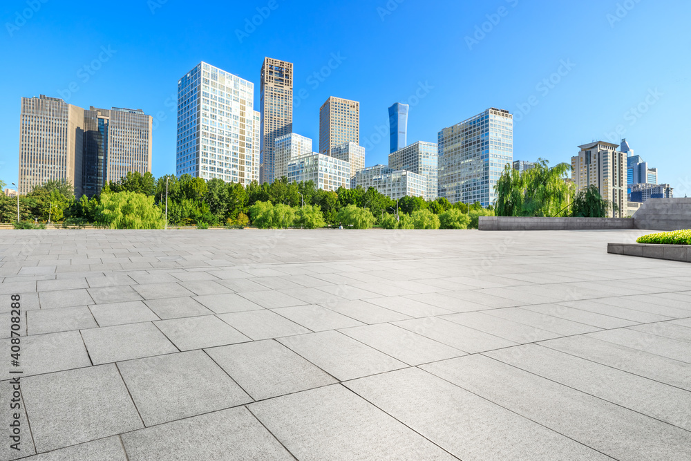 Empty square floor and modern city commercial buildings in Beijing,China. Empty square floor and modern city commercial buildings in Beijing,China.