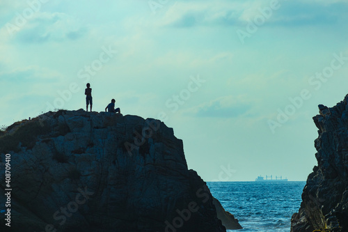 two friends on a rock in the sea  © Alfonso