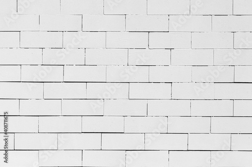Vintage white stone brick wall pattern and seamless background