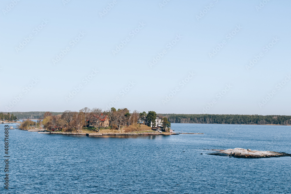 Spring Baltic sea landscape near Stockholm seacost. Local tourism concept, spring nature, selective focus