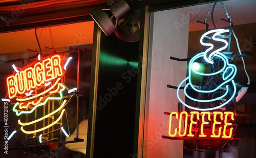 Wallpaper Mural Night view of colorful neon signs of restaurants on the streets of the city Torontodigital.ca