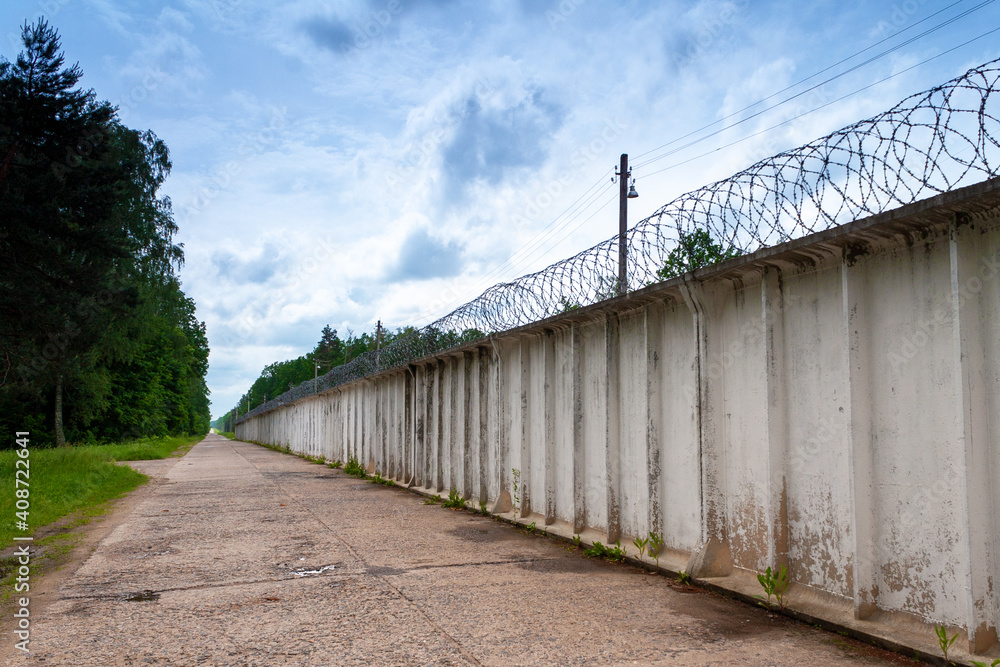 Wall and barbed wire,restricted area