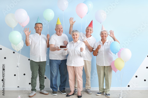 Senior people celebrating B...