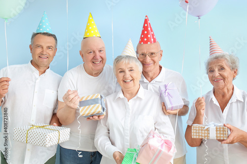 Senior people celebrating B...