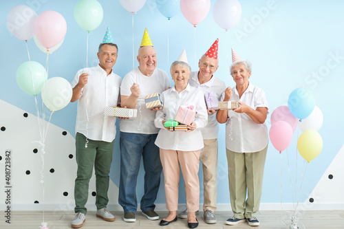 Senior people celebrating B...