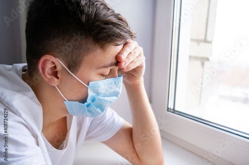 Sad Young Man in Flu Mask