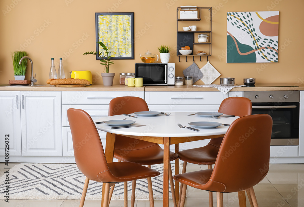 Dinning table in interior of modern kitchen Dinning table in interior of modern kitchen