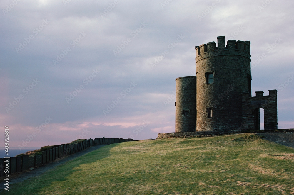 Low angle view of towers at a coast, O'Brien's Tower, Cliffs Of Moher, County Clare, Munster Province, Republic of Ireland Low angle view of towers at a coast, O'Brien's Tower, Cliffs Of Moher, County Clare, Munster Province, Republic of Ireland