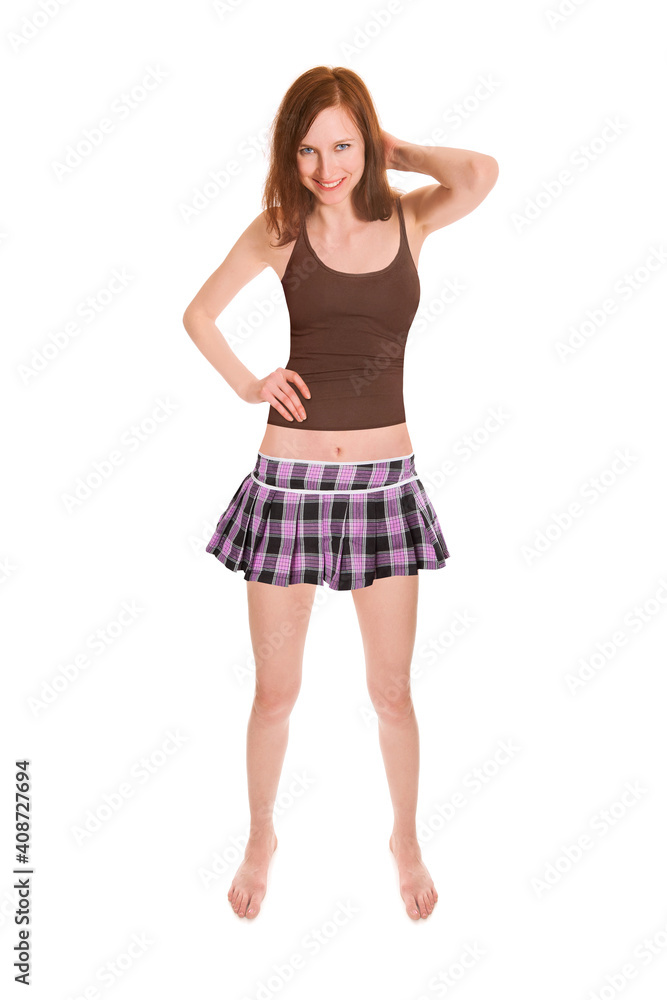 Full length portrait of a beautiful happy woman wearing a pink miniskirt and a summer top, isolated on white studio background Full length portrait of a beautiful happy woman wearing a pink miniskirt and a summer top, isolated on white studio background
