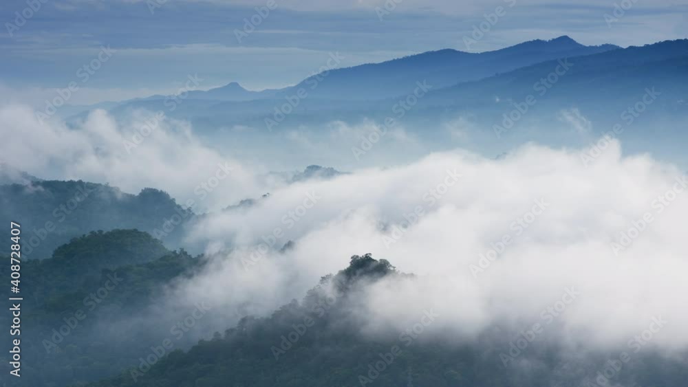 Time lapse video 4k, Aerial view Beautiful of morning scenery Golden light sunrise And the mist flows on high mountains Time lapse video 4k, Aerial view Beautiful of morning scenery Golden light sunrise And the mist flows on high mountains