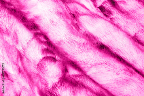 Pink artificial fur background texture for design, rose fake animal fell