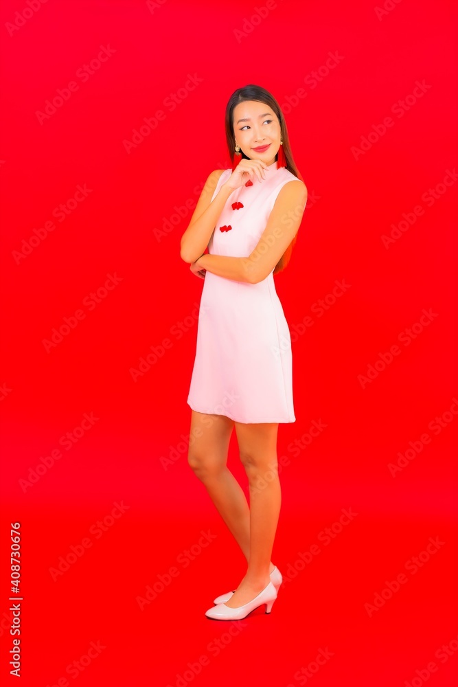 Portrait beautiful young asian woman wear chinese new year clothing Portrait beautiful young asian woman wear chinese new year clothing