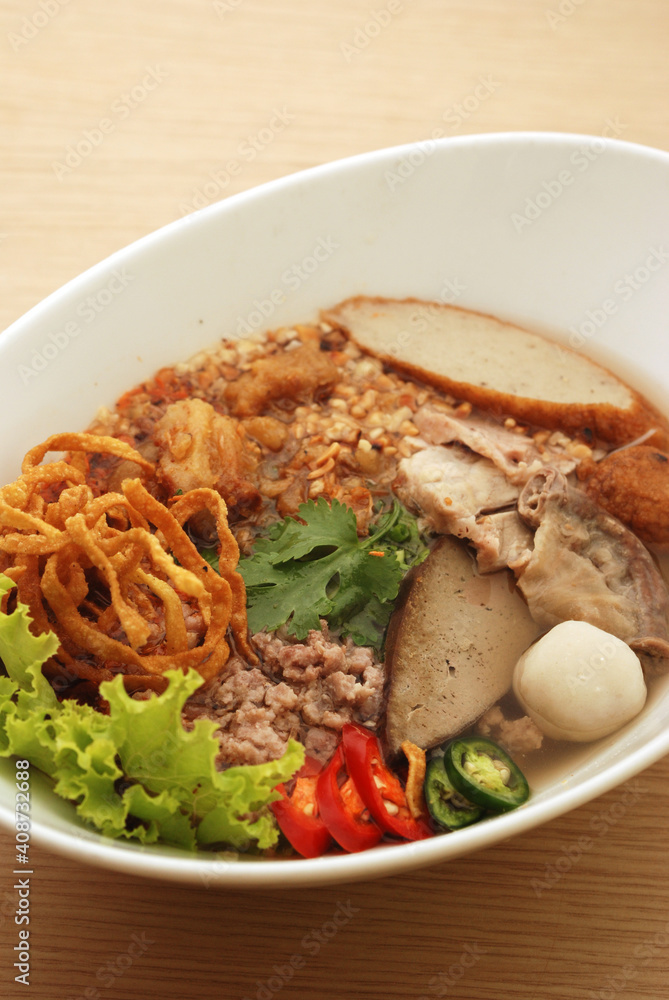 spicy noodles with fish ball and minced pork (Tom Yum Noodles) - Asian food style spicy noodles with fish ball and minced pork (Tom Yum Noodles) - Asian food style
