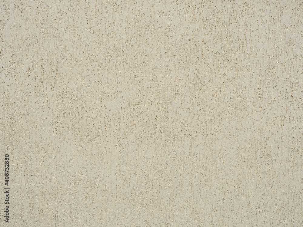 Fototapeta premium Beige wall with decorative plaster with patterned scratches. Texture not seamless