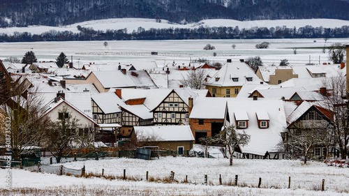 The village of Herleshausen in the wintertime photo