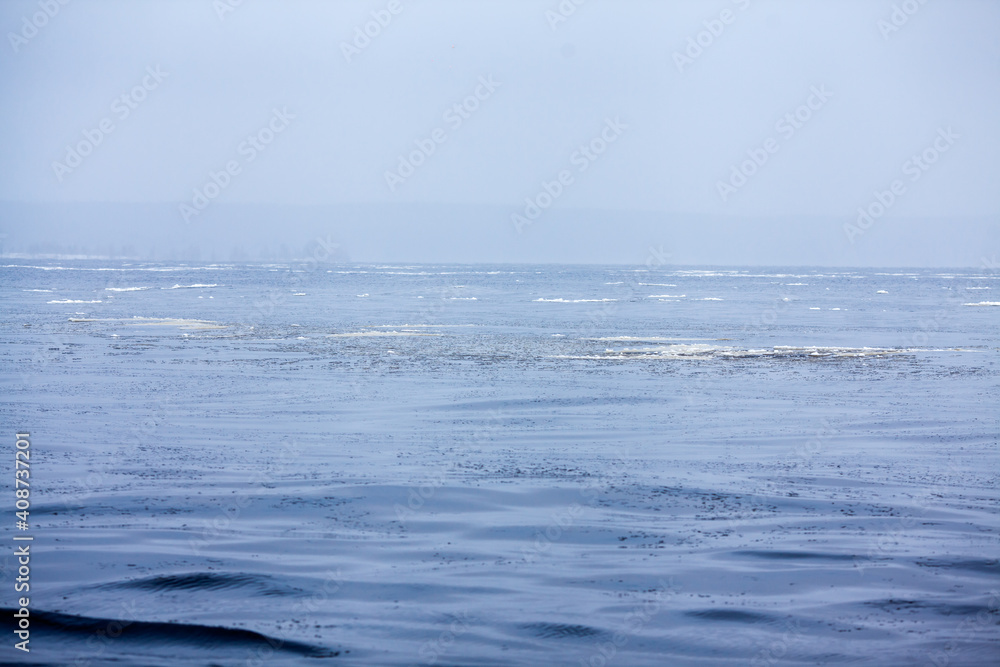 Water surface with small ice floes. Cold water