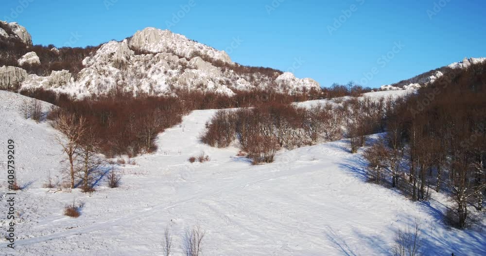 Aerial view of a mountain range in snow, Velebit mountain, Croatia Aerial view of a mountain range in snow, Velebit mountain, Croatia