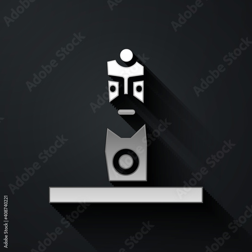 Silver Slavic pagan idol icon isolated on black background. Antique ritual wooden idol. Long shadow style. Vector.