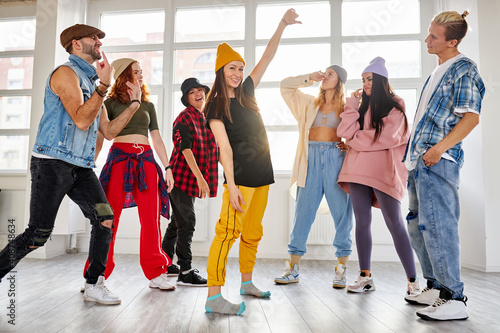 dancers posing moving  making house hip-hop dance elements dancing with pleasure in studio