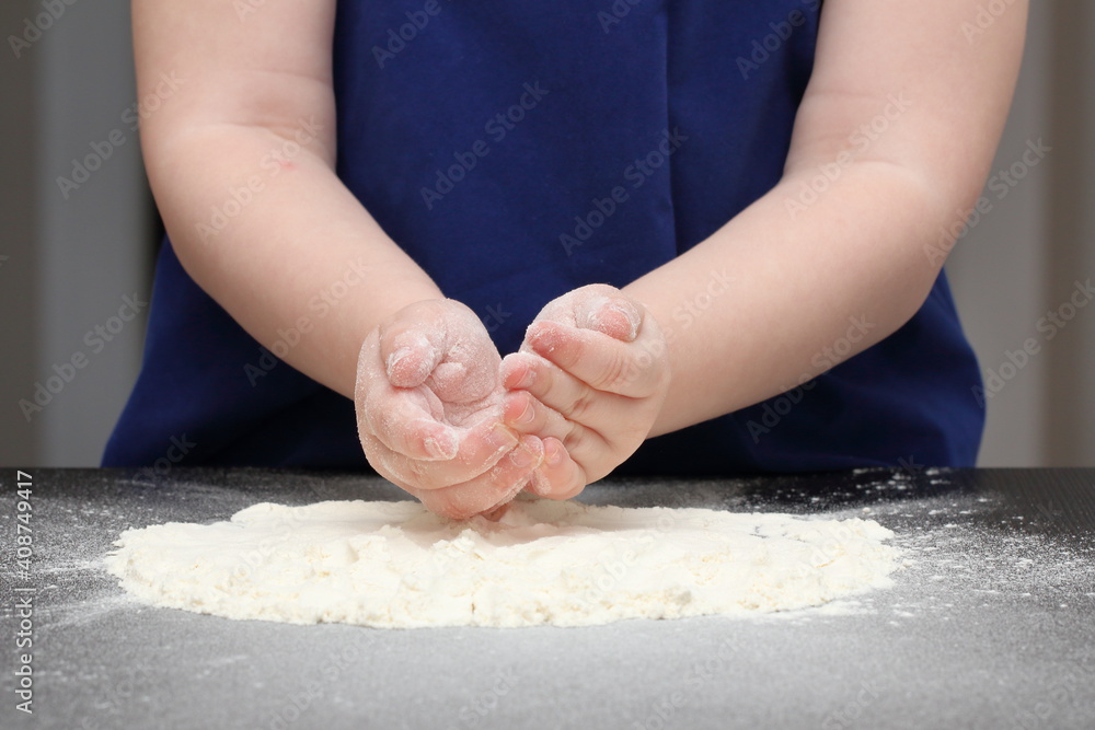 a child prepares cookie dough a child prepares cookie dough