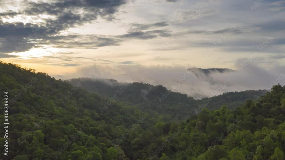 Hyper lapse video 4k, Aerial view Beautiful of morning scenery Golden light sunrise And the mist flows on high mountains Hyper lapse video 4k, Aerial view Beautiful of morning scenery Golden light sunrise And the mist flows on high mountains