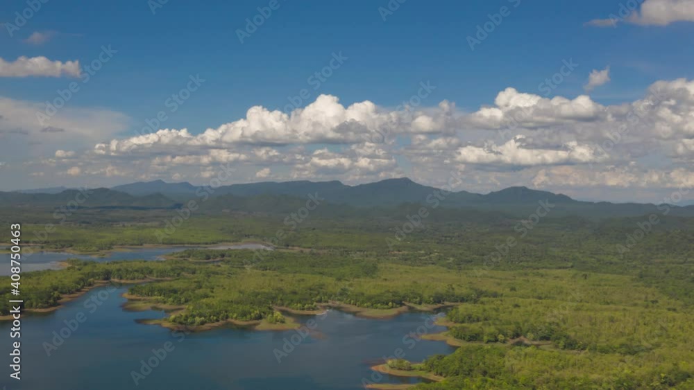 Hyper lapse 4K Aerial view, Clouds move through the water reservoir during the clear day. Hyper lapse 4K Aerial view, Clouds move through the water reservoir during the clear day.