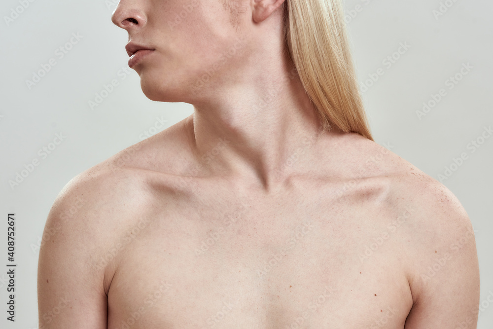 Collarbone of young slim long haired naked male model Collarbone of young slim long haired naked male model