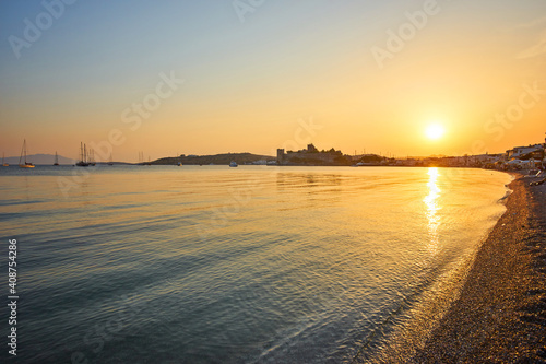 Fototapeta Naklejka Na Ścianę i Meble -  Panoramic Sunset view of Gumbet bay in Bodrum on Turkish Riviera. Bodrum is a district and a port city in Mugla Province