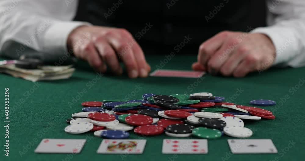 Poker player pulling in a pile of chips, large win, jackpot, successful game. Fortune, luck, gambling Poker player pulling in a pile of chips, large win, jackpot, successful game. Fortune, luck, gambling