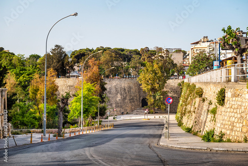 Fototapeta Naklejka Na Ścianę i Meble -  Main streets of Heraklion town center. Ikarou Avenue and Venetian Gate St. George. Sunny day. 