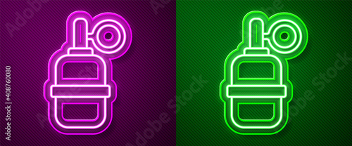 Glowing neon line Hand grenade icon isolated on purple and green background. Bomb explosion. Vector.