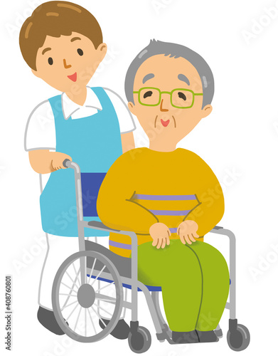 車椅子に乗った年配の男性と介護士