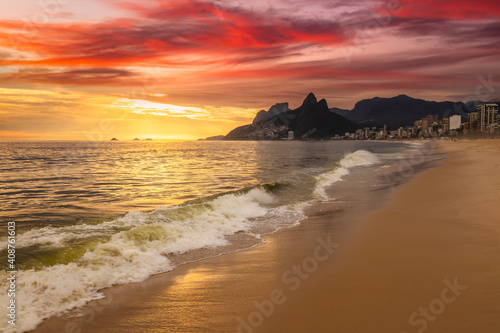 Sunset on the ocean at Rio de Janeiro, Ipanema beach. Brazil.