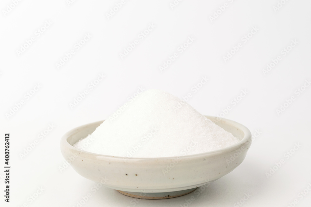 White sugar on white background White sugar on white background