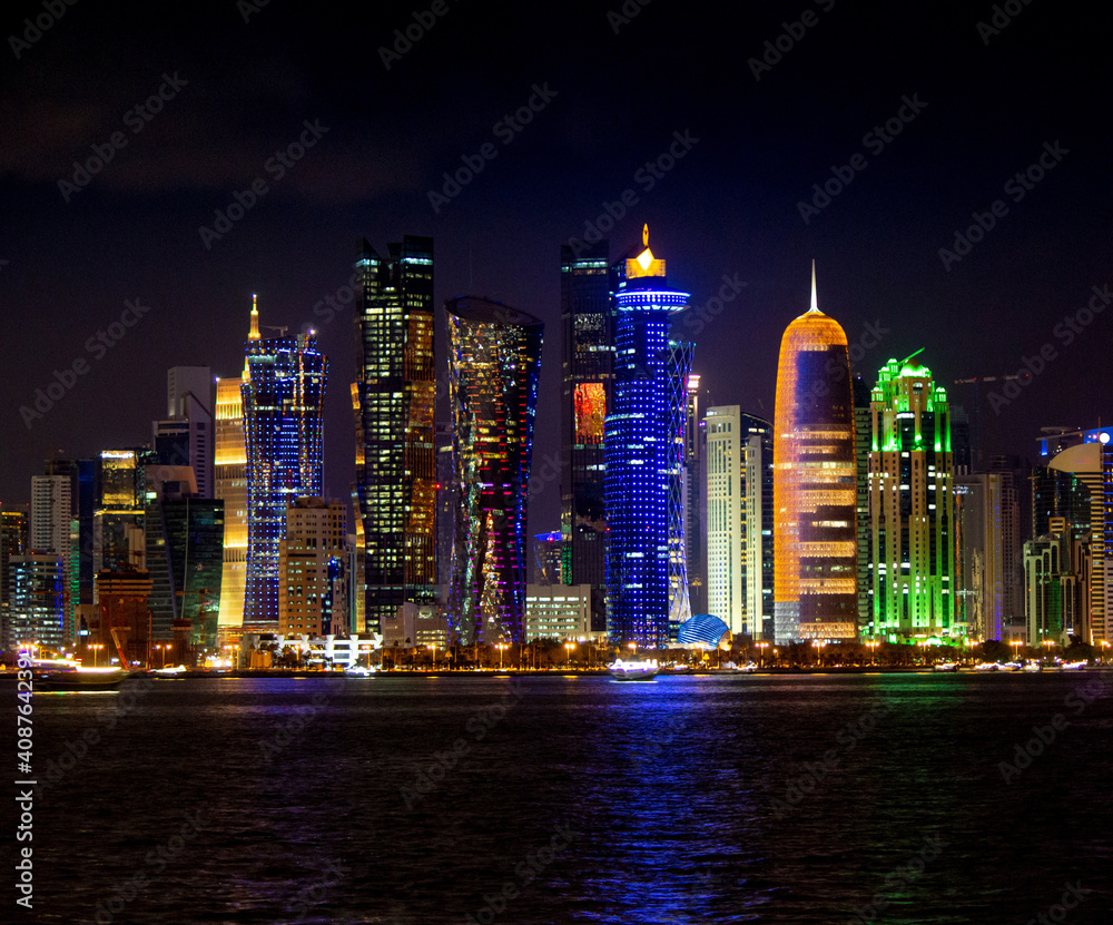Naklejka premium background image of qatar's capital city landmark during sunset. tourist destinations